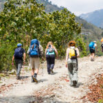 A group of trekkers walking in the Pokhara region at a zenith sanctuaries trek